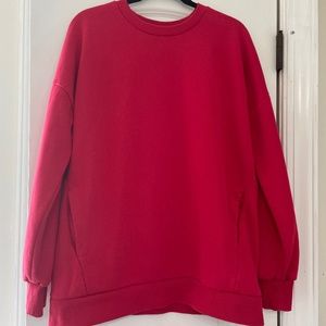 Red sweatshirt with pockets
